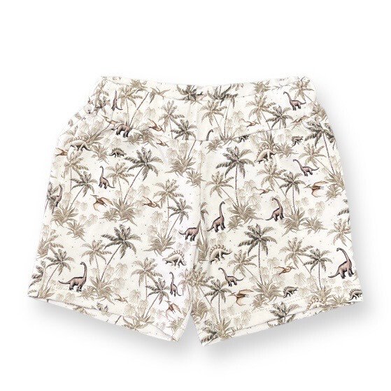 Babyshorts „Dino Tropics“ mit tropischem Dino-Print von Feathers®
Handgemachte GOTS-Babyshorts mit Dino-Design aus Bio-Baumwolle
Nachhaltige Sommer-Shorts für Babys mit Dschungel-Muster