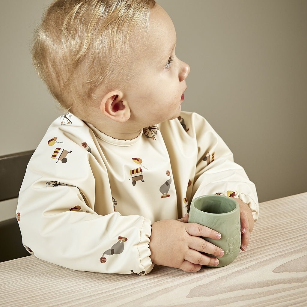 Kinder-Lätzchen aus recyceltem Polyester mit Zirkusprint