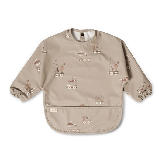 Langarm-Lätzchen „Karneval“ mit Karnevalszug-Print in Creme von Nuuroo